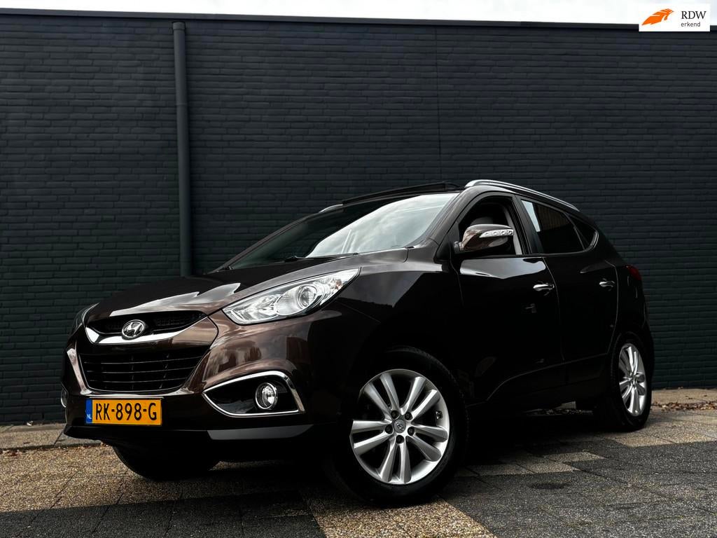 Hyundai Ix35 2.0i 4WD | Panoramadak | Stoelverwarming | Navi, Automaat, Gebruikt, Zwart, 4 cilinders