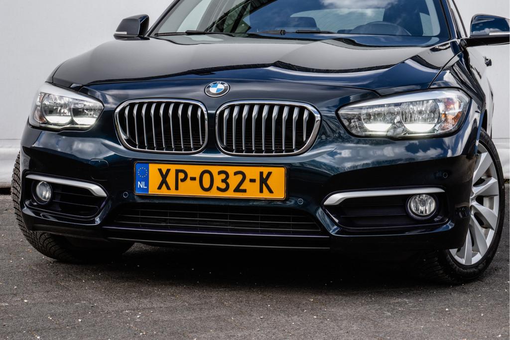 BMW 1-serie 118i 136pk Aut.8 Urban Lederen int/ Stoelverwarm, Auto's, BMW, Gebruikt, Met garantie (alle), Blauw, Leder