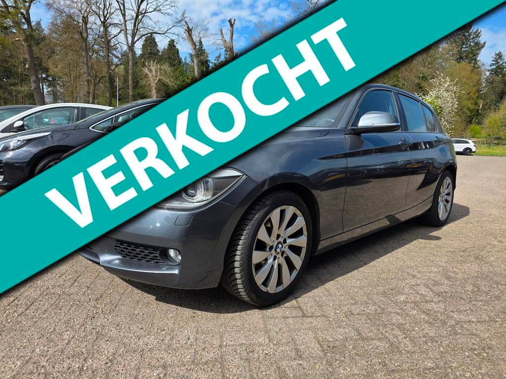 BMW 1-serie 118i Business+ AUTOMAAT/navi/CRUISE, Auto's, BMW, Euro 5, Achterwielaandrijving, Gebruikt, 4 cilinders