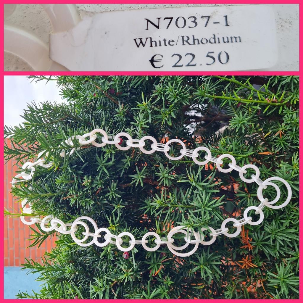 Bijzondere Rhodium white ketting met ringen wit 4 euro nieuw, Ophalen of Verzenden, Nieuw, Wit, Overige materialen