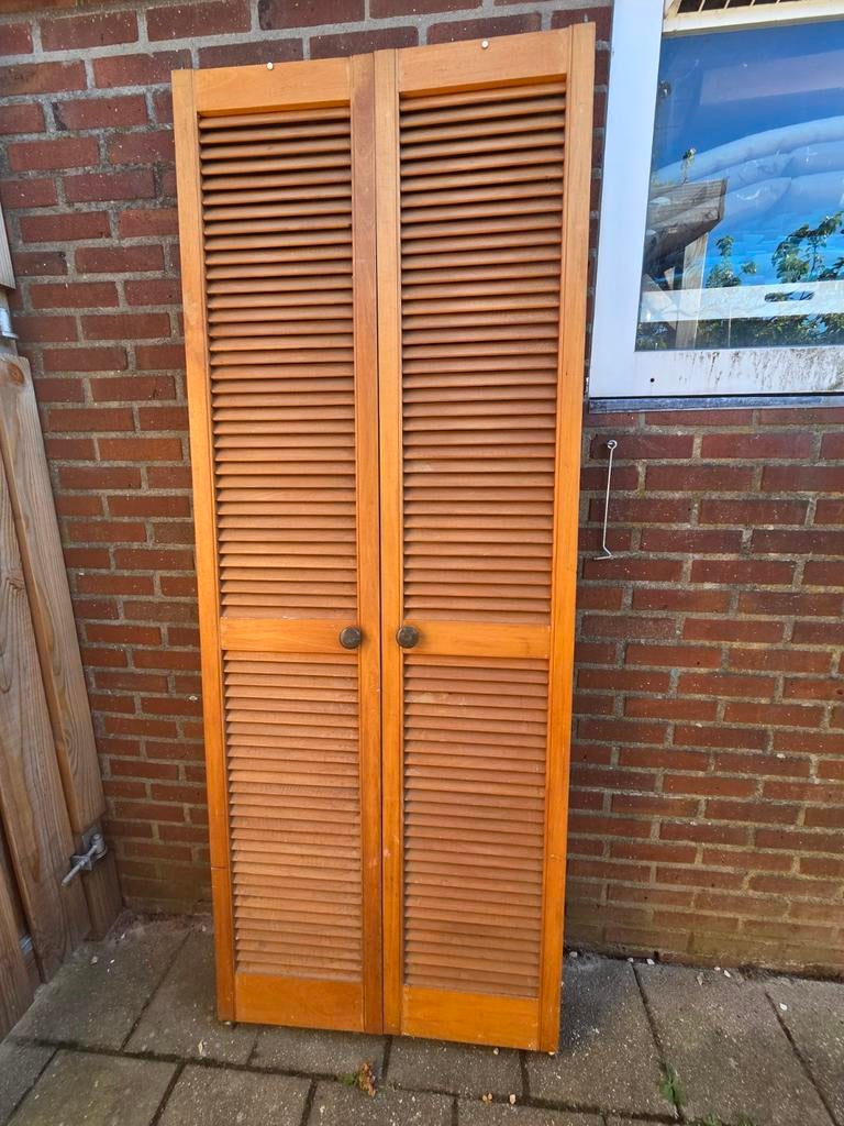 Houten louvredeuren, Ophalen