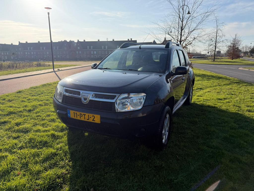 Dacia Duster 1.6 16V 74KW 2011 Zwart, Auto's, Voorwielaandrijving, 4 cilinders, Duster, 1200 kg