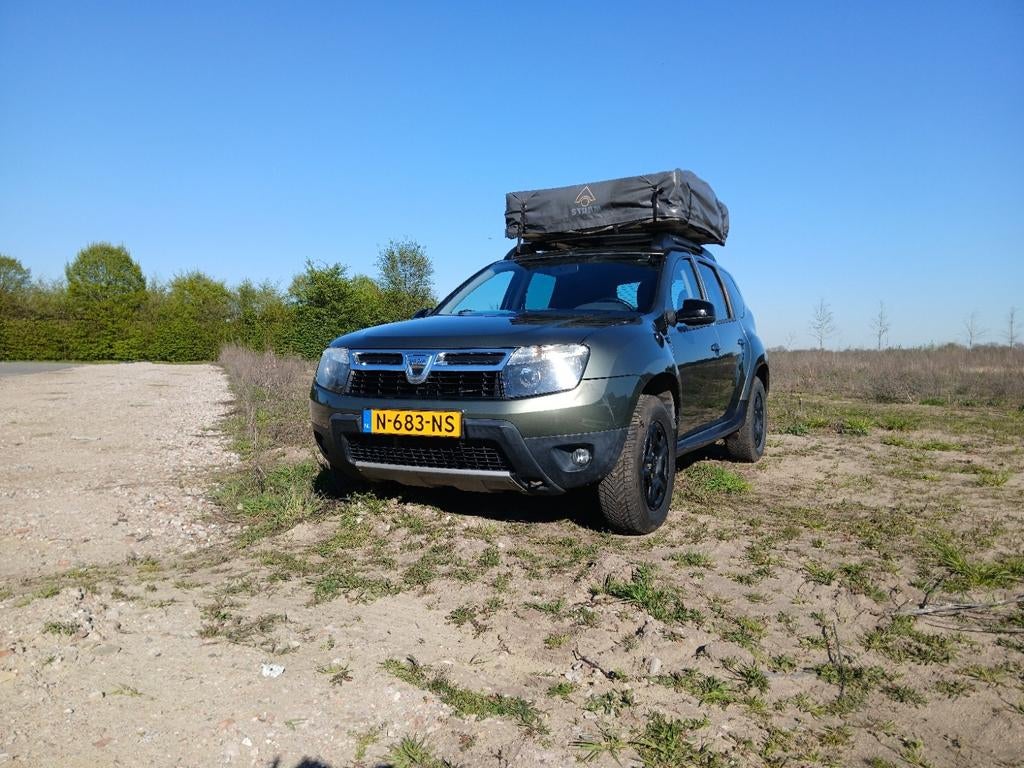 Dacia Duster 1.6 2012 limited edition delsey, Auto's, Voorwielaandrijving, Stof, Zwart, 4 cilinders