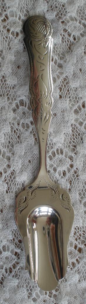 Fraaie verzilverde suikerschep - Niekerk (O-BLD), Ophalen of Verzenden