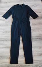 Imagine zwarte travelstof jumpsuit maat 42, Kleding | Dames, Jumpsuits, Ophalen of Verzenden, Zo goed als nieuw, Maat 42/44 (L)