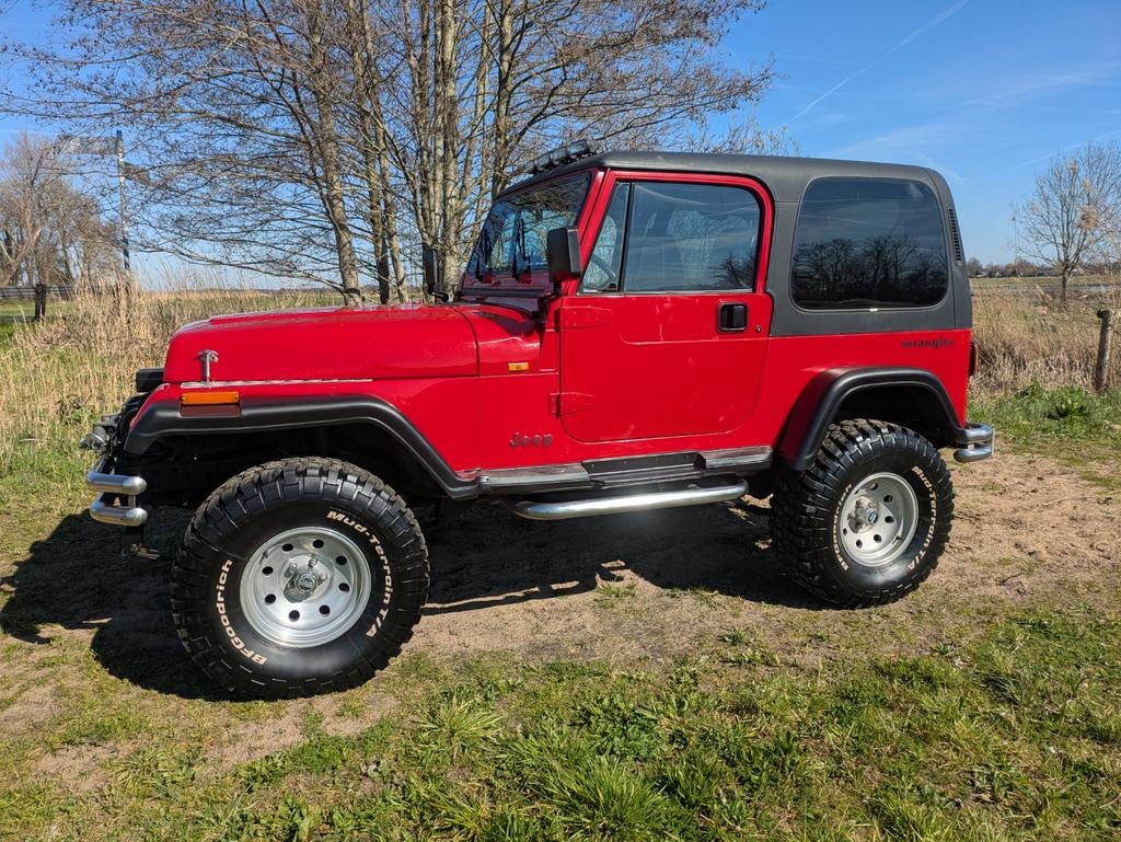 Jeep Wrangler 4.0i HO Hardtop AUT 4WD 1995 Rood, Auto's, Jeep, 450 kg, 1520 kg, 2500 kg, Origineel Nederlands