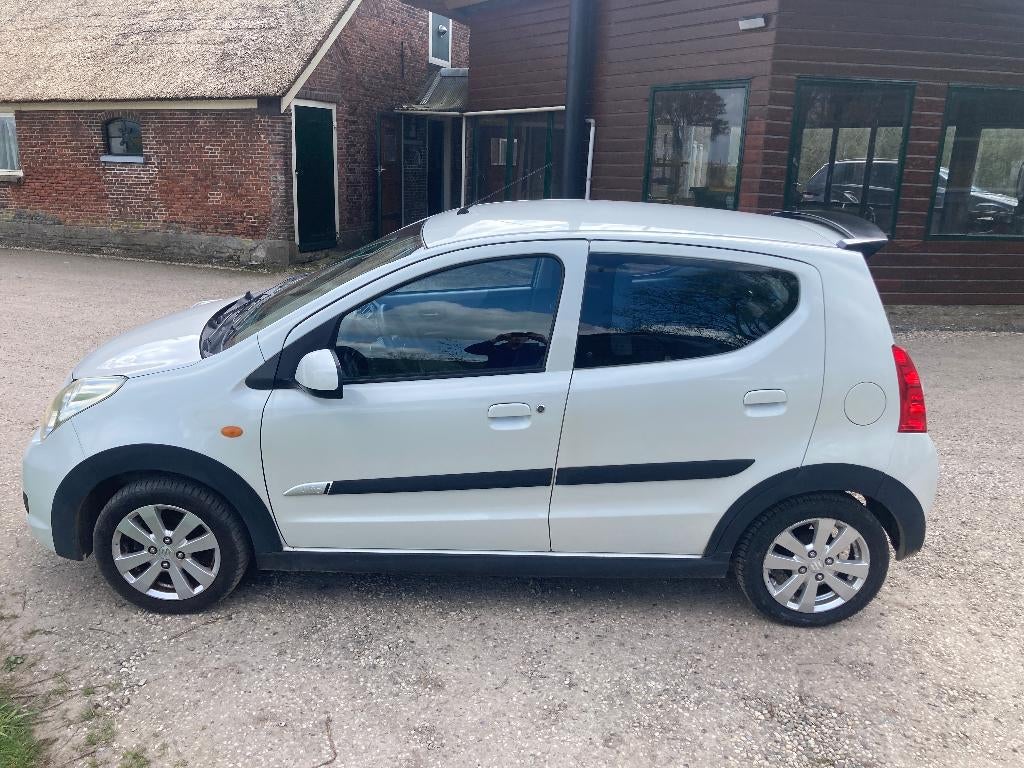 Suzuki Alto 1.0 2012 Wit Metallic Cross uitvoering, Voorwielaandrijving, Stof, 200 kg, 4 stoelen