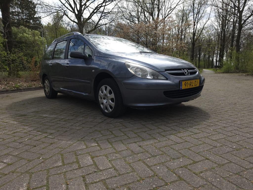 Peugeot 307 1.6 16V SW 2005 Grijs, Auto's, 4 cilinders, Origineel Nederlands, Stationwagon, Handgeschakeld