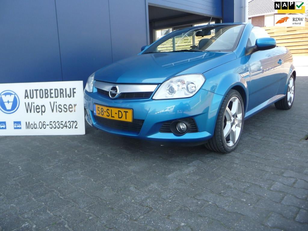 Opel Tigra TwinTop 1.8-16V Linea Rosso, Auto's, Opel, 125 pk, Gebruikt, Zwart, Blauw