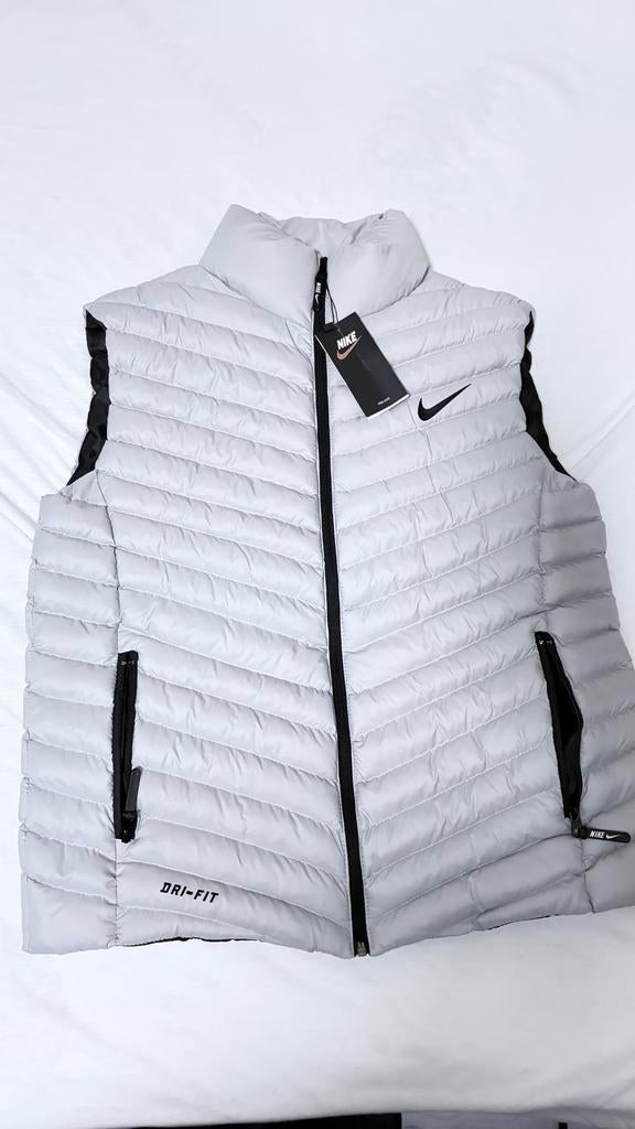 Nike Grijze Bodywarmer - Comfortabel en Stijlvol, Ophalen of Verzenden, Zo goed als nieuw, Overige maten, Grijs
