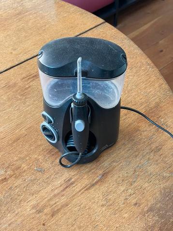 Waterpik water flosser  beschikbaar voor biedingen