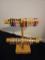 Partij van 560 elastieken armbandjes met kruisjes, Overige materialen, Overige kleuren, Nieuw, Ophalen of Verzenden
