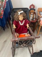 Pop met antieke kinderwagen, Ophalen