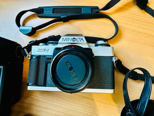 Minolta XG-1 met lenzen en accessoires boekjes hoes flitsers, Audio, Tv en Foto, Fotocamera's Analoog, Gebruikt, Spiegelreflex