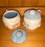 Opa en oma kopje met kaars samen, Ophalen