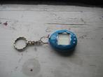 Bandai 1997 - turquoise Tamagotchi (met gebr. aanwijzing), 1 speler, Ophalen of Verzenden, Gebruikt, Vanaf 3 jaar