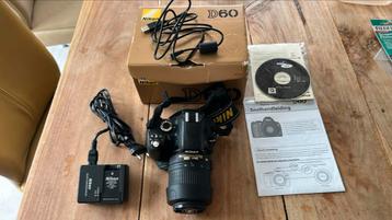 Nikon D60 met 18-55 lens en toebehoren beschikbaar voor biedingen