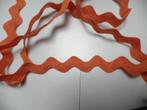 Zolderopruiming -10 mtr x 2 cm-oranje brede zigzag-superleuk, Hobby en Vrije tijd, Naaien en Fournituren, Ophalen of Verzenden