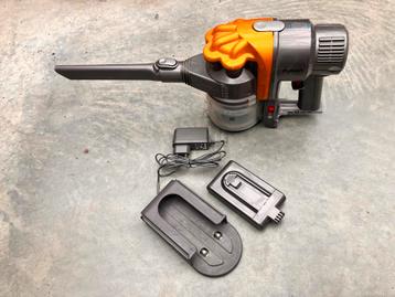 Dyson accu + oplader. beschikbaar voor biedingen
