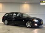 BMW 3-serie Touring 318i Business Line / Airco / Navi / Crui, Achterwielaandrijving, Zwart, Handgeschakeld, Grijs