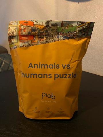 Animals vs. humans puzzle / puzzel bag - 1000 stukjes Piab