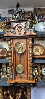 Regulateur klok met brons, Ophalen