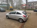 Opel Corsa 1.0 12V 3D 2007 Grijs, Auto's, Opel, Voorwielaandrijving, 450 kg, Handgeschakeld, 3 cilinders