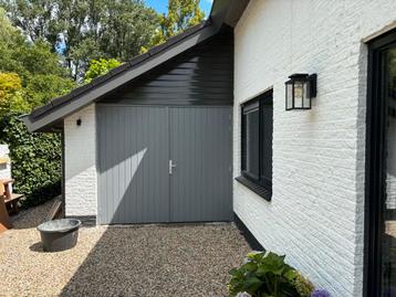 Houten Garagedeuren nieuw en op maat gemaakt beschikbaar voor biedingen
