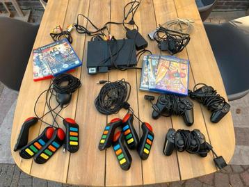 PlayStation 2 Compleet Pakket met 6 spellen en Buzz beschikbaar voor biedingen