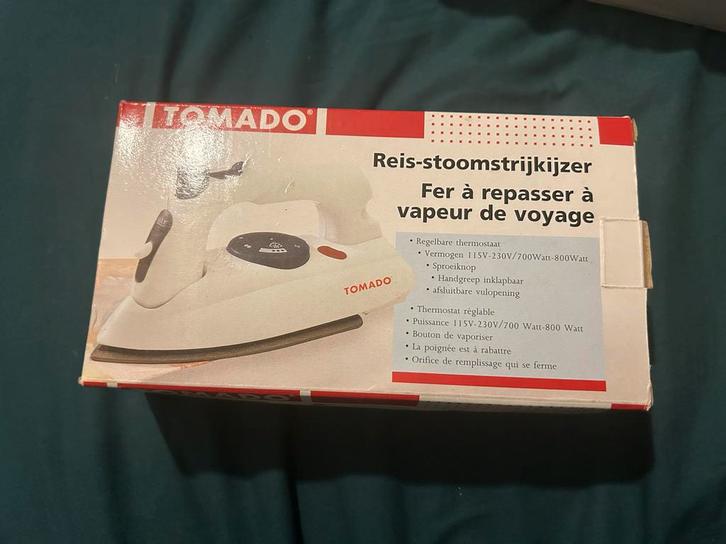 Nieuwe Tomado Reisstoomstrijkijzer, Witgoed en Apparatuur, Strijkijzers en Strijkplanken, Nieuw, Strijkijzer met snoer, Ophalen of Verzenden