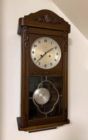 Mooie vintage wandklok beschikbaar voor biedingen