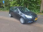 Chevrolet Aveo bj 2010 met APK, Auto's, Voorwielaandrijving, Stof, 4 cilinders, Zwart