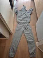 Grijze Calvin Klein trainingspak s, Kleding | Dames, Broeken en Pantalons, Nieuw, Ophalen of Verzenden, Maat 36 (S), Grijs