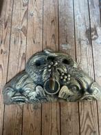 Antieke zware wandfontein, Ophalen