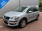 Volkswagen Touran 1.4 TSI 140PK Cross 7-Persoons Nieuwe Kett, Auto's, Voorwielaandrijving, Stof, Gebruikt, 4 cilinders