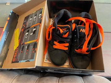 Als nieuwe! Heelys zwart oranje maat 32 beschikbaar voor biedingen