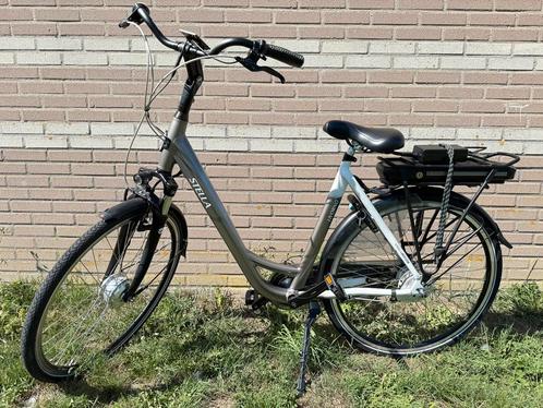 In nieuwe staat Stella Elektrische Damesfiets, Fietsen en Brommers, Fietsaccessoires | Fietsaccu's, Zo goed als nieuw, Ophalen