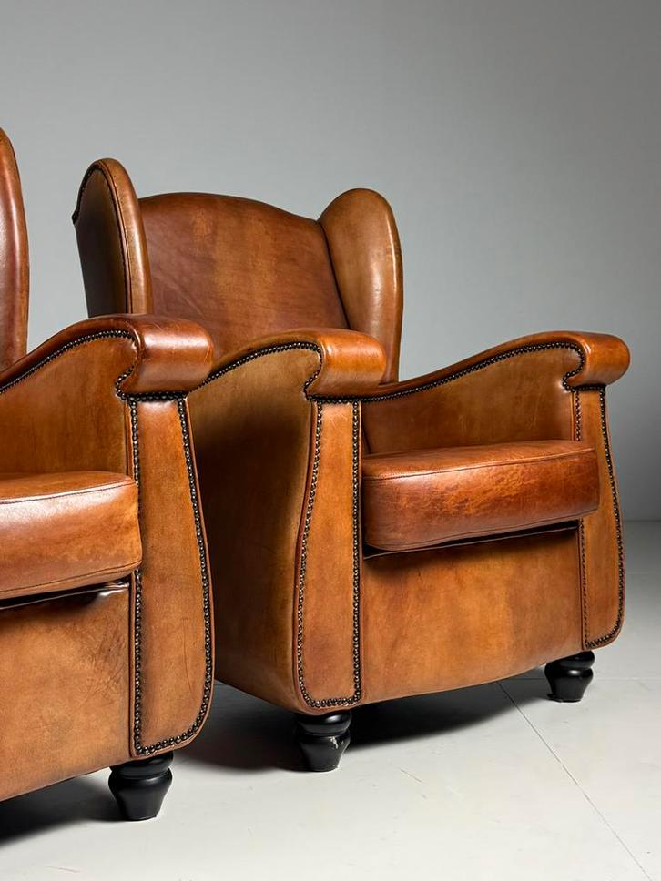 Set van 2 schapenleren fauteuils, Huis en Inrichting, Fauteuils, Zo goed als nieuw, 75 tot 100 cm, Ophalen