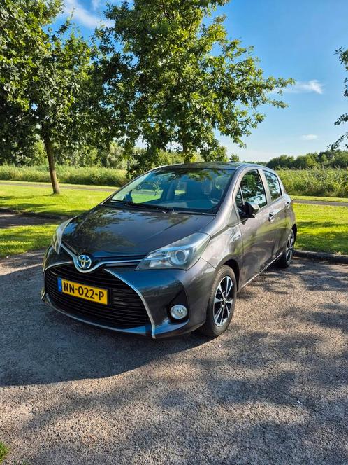 Toyota Yaris 1.5 HSD 55KW 5DRS 2016 Grijs, Auto's, Toyota, Particulier, Yaris, ABS, Achteruitrijcamera, Airbags, Airconditioning