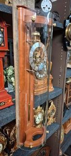 Prachtige ams klok, Ophalen