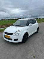 Suzuki Swift 1.3 5D 2010 Wit, Auto's, Voorwielaandrijving, Navigatiesysteem, 40 €/maand, 400 kg