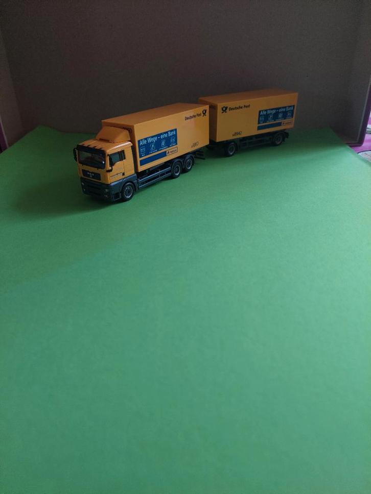 498 herpa man tga lx combi deutsche post dhl 1:87 truck, Hobby en Vrije tijd, Modelauto's | 1:87, Zo goed als nieuw, Bus of Vrachtwagen