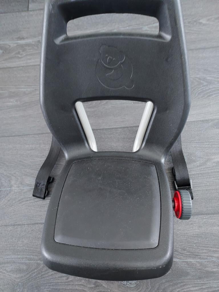 Qibell fietstoeltje, Ophalen