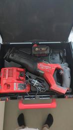 Milwaukee FUEL reciprozaag met accu en lader, Ophalen