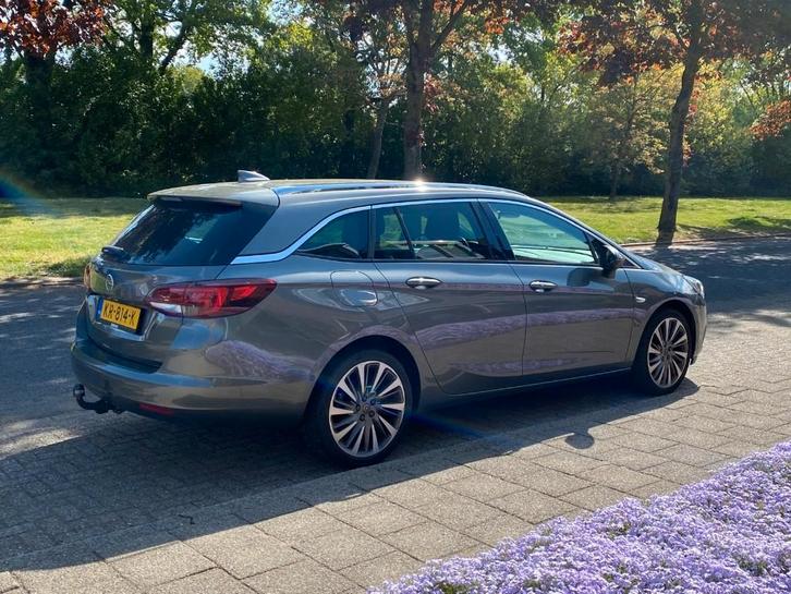 Opel Astra 1.4 Turbo 110KW Sports Tourer AT 2016 Grijs, Auto's, Opel, Particulier, Astra, ABS, Achteruitrijcamera, Airbags, Airconditioning