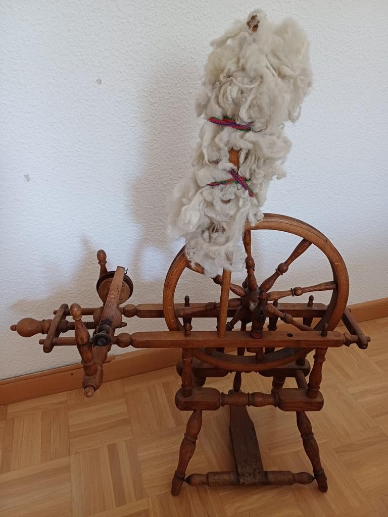 Antiek spinnewiel, Ophalen