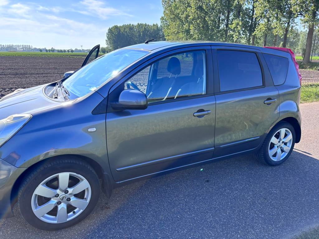 Nissan Note 1.4 16V 2006 Grijs, Auto's, Nissan, Voorwielaandrijving, Stof, 40 €/maand, Zwart
