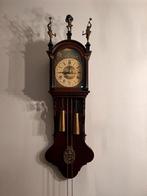 Antieke Friese staartklok, Ophalen