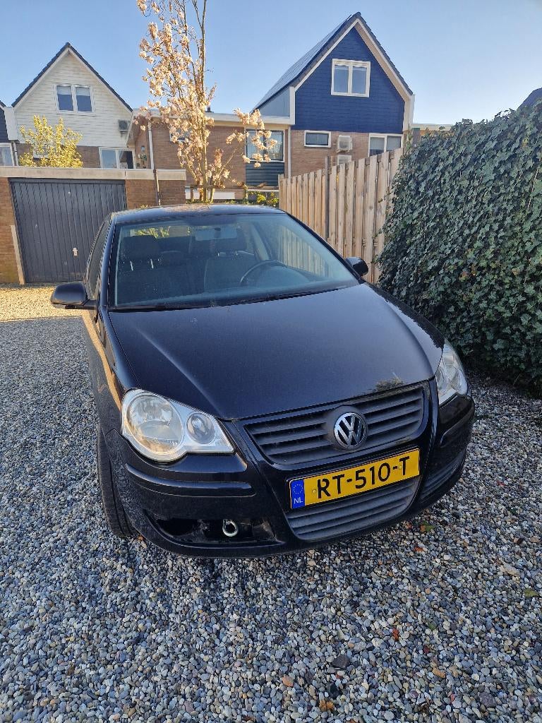 Volkswagen Polo 1.2 40KW 2005 Zwart, Auto's, Voorwielaandrijving, 54 pk, 989 kg, 1198 cc