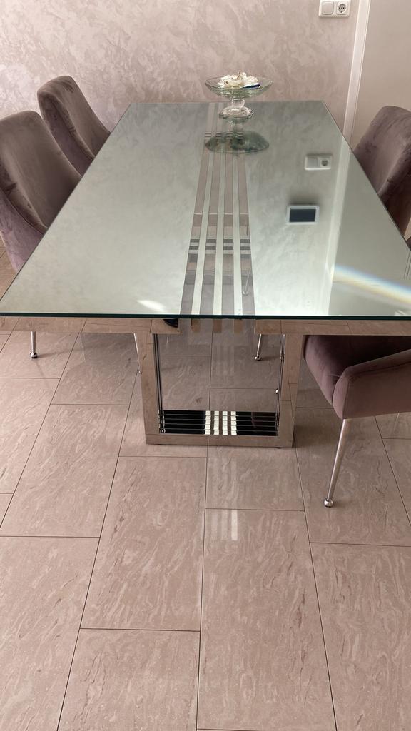Moderne glazen eettafel met RVS onderstel – 6 personen, Gebruikt, 100 tot 150 cm, Glas, Vier personen